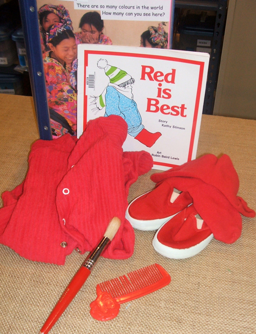 Red is best [story kit] / based on the book by Kathy Stinson ; illustrated b Robin Baird Lewis.