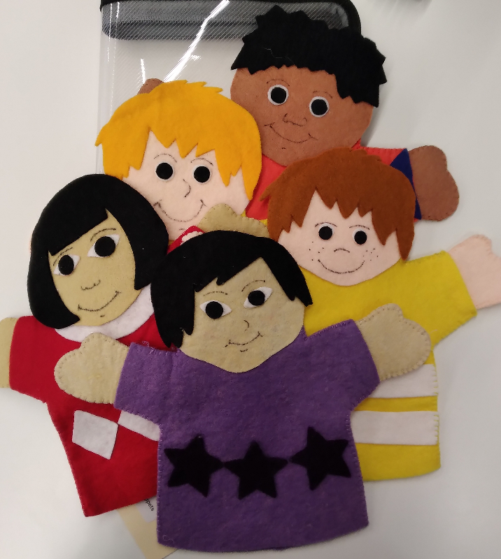 Packet of People [hand puppets]